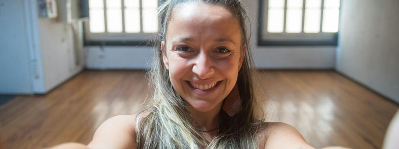 Wide view of a serene and empty yoga studio